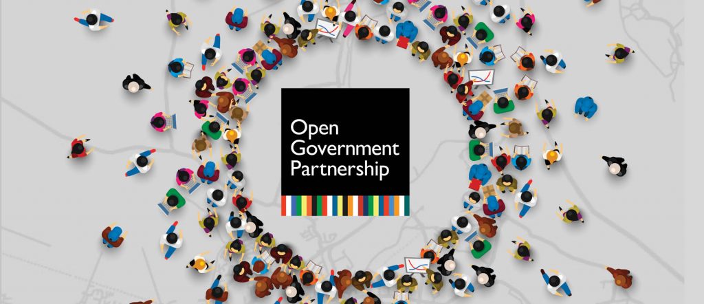 image of an infographic of people forming a circle with the Open Government Partnership logo in the middle and a grey background